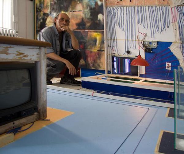 cropped: The Medium of Television: John Naccarato, Vertebra, Part 2: The Skinning of Memory (VP2) 20’W x 17’H x 16’D. Immersive, Trans-media, Installation. Partial overview of VP2: right top. Artist Studio, University of Ottawa, Canada 2009